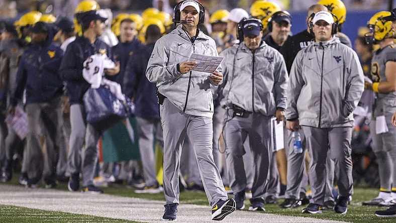 Sep 9, 2023; Morgantown, West Virginia, USA; West Virginia Mountaineers head coach Neal Brown walks long the sidelines during the second quarter against the Duquesne Dukes at Mountaineer Field at Milan Puskar Stadium. Mandatory Credit: Ben Queen-USA TODAY Sports