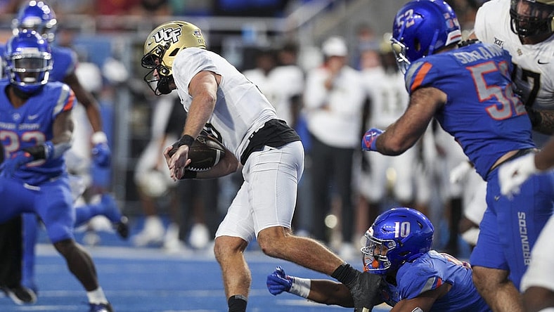 Sep 9, 2023; Boise, Idaho, USA; UCF Knights quarterback John Rhys Plumlee (10) during the second half of play versus the Boise State Broncos at Albertsons Stadium. UCF beats Boise State 18-16. Mandatory Credit: Brian Losness-USA TODAY Sports