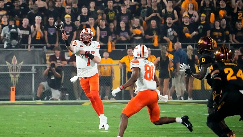 Sep 9, 2023; Tempe, Arizona, USA; Oklahoma State Cowboys quarterback Alan Bowman (7) throws a to wide receiver Brennan Presley (80) against the Arizona State Sun Devils in the first half at Mountain America Stadium. Mandatory Credit: Rob Schumacher-Arizona Republic