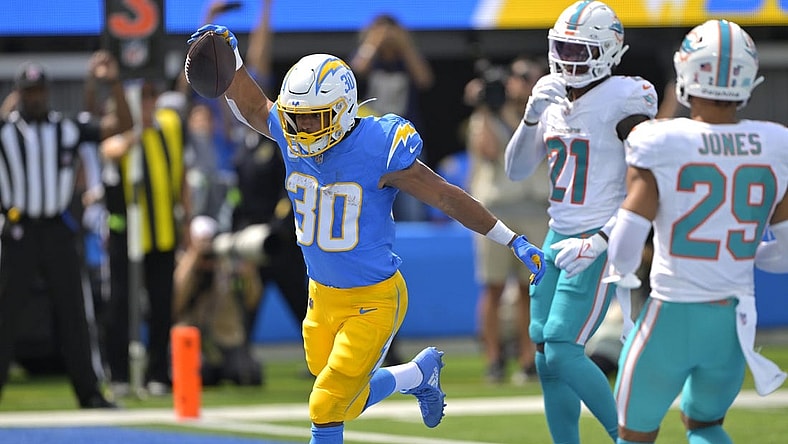 Sep 10, 2023; Inglewood, California, USA; Los Angeles Chargers running back Austin Ekeler (30) celebrates after a touchdown in the first half against the Miami Dolphins at SoFi Stadium. Mandatory Credit: Jayne Kamin-Oncea-USA TODAY Sports