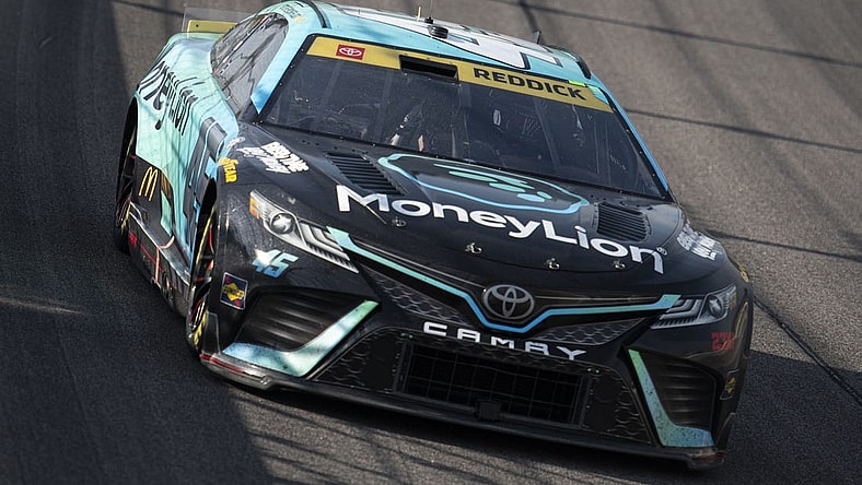 Sep 10, 2023; Kansas City, Kansas, USA; NASCAR Cup Series driver Tyler Reddick (45) races during the NASCAR Cup Series Hollywood Casino 400 at Kansas Speedway. Mandatory Credit: Amy Kontras-USA TODAY Sports