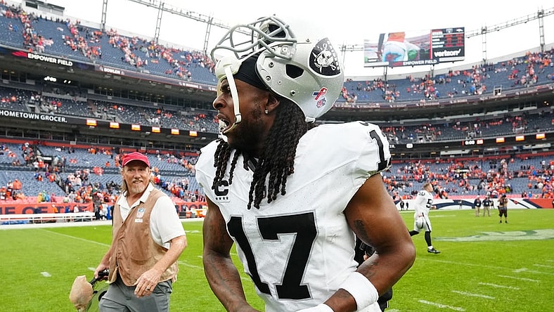 Sep 10, 2023; Denver, Colorado, USA; Las Vegas Raiders wide receiver Davante Adams (17) reacts following the win over the Denver Broncos at Empower Field at Mile High. Mandatory Credit: Ron Chenoy-USA TODAY Sports