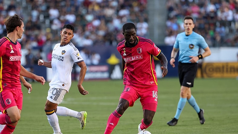 Sep 10, 2023; Carson, California, USA; St. Louis CITY SC forward Samuel Adeniran (16) controls the ball in the first half against the Los Angeles Galaxy at Dignity Health Sports Park. Mandatory Credit: Kiyoshi Mio-USA TODAY Sports