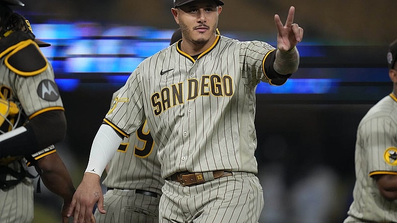 Sep 11, 2023; Los Angeles, California, USA; San Diego Padres third baseman Manny Machado (13) reacts at the end of the game against the Los Angeles Dodgers at Dodger Stadium. Mandatory Credit: Kirby Lee-USA TODAY Sports