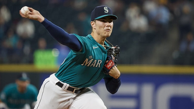 Sep 12, 2023; Seattle, Washington, USA; Seattle Mariners starting pitcher Bryan Woo (33) throws against the Los Angeles Angels during the first inning at T-Mobile Park. Mandatory Credit: Joe Nicholson-USA TODAY Sports