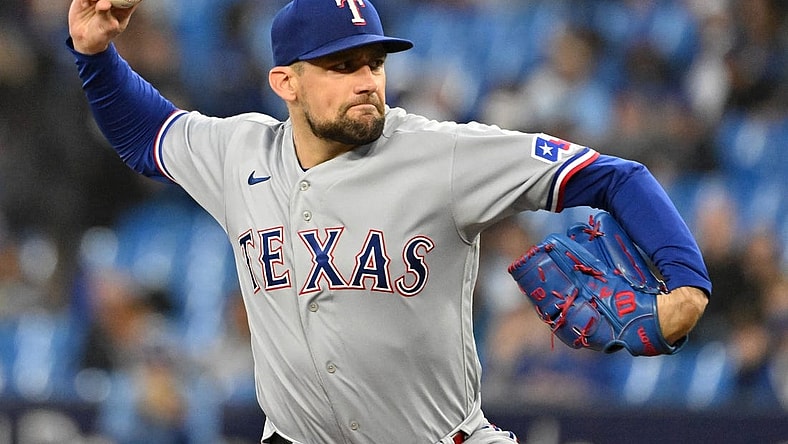 Sep 14, 2023; Toronto, Ontario, CAN; Texas Rangers starting pitcher Nathan Eovaldi (17) delivers a pitch against the Toronto Blue Jays in the first inning at Rogers Centre. Mandatory Credit: Dan Hamilton-USA TODAY Sports