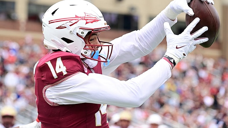 Sep 16, 2023; Chestnut Hill, Massachusetts, USA; Florida State Seminoles wide receiver Johnny Wilson (14) makes a catch during the first half against the Boston College Eagles at Alumni Stadium. Mandatory Credit: Eric Canha-USA TODAY Sports