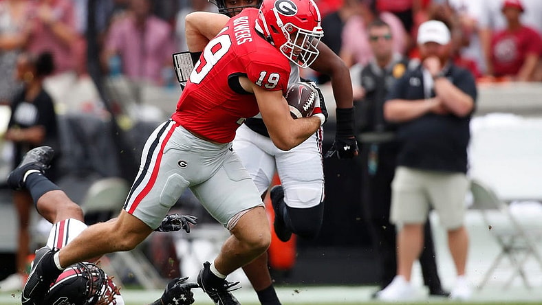 Georgia tight end Brock Bowers (19) moves the ball during the first half of a NCAA college football game against South Carolina in Athens, Ga., on Saturday, Sept. 16, 2023.