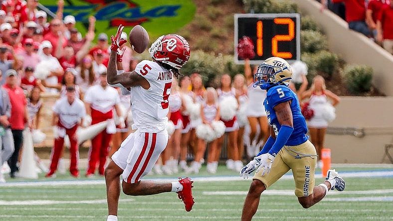 Sep 16, 2023; Tulsa, Oklahoma, USA; Oklahoma's Andrel Anthony (5) catches a pass for a first down in the first quarter against the Tulsa Golden Hurricane at Skelly Field at H.A. Chapman Stadium. Mandatory Credit: Nathan J. Fish-USA TODAY Sports