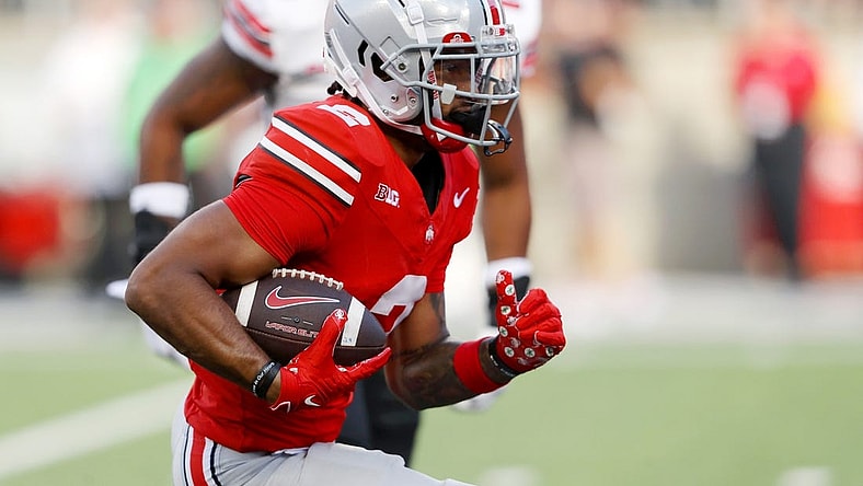 Sep 16, 2023; Columbus, Ohio, USA; Ohio State Buckeyes wide receiver Emeka Egbuka (2) runs for a touchdown during the second quarter against the Western Kentucky Hilltoppers at Ohio Stadium. Mandatory Credit: Joseph Maiorana-USA TODAY Sports