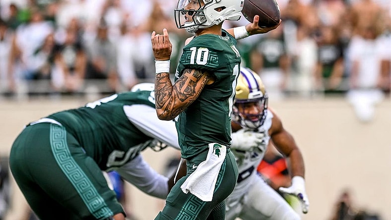 Michigan State's Noah Kim throws a pass against Washington during the second quarter on Saturday, Sept. 16, 2023, at Spartan Stadium in East Lansing.