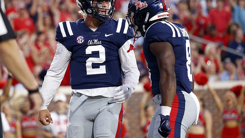 Sep 16, 2023; Oxford, Mississippi, USA; Mississippi Rebels quarterback Jaxson Dart (2) reacts with running back Jam Griffin (8) after a touchdown during the first half against the Georgia Tech Yellow Jackets at Vaught-Hemingway Stadium. Mandatory Credit: Petre Thomas-USA TODAY Sports