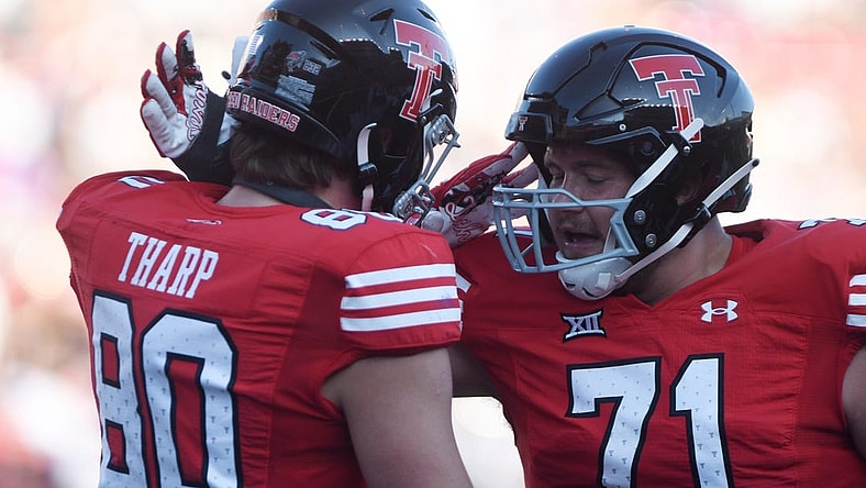 Texas Tech's tight end Mason Tharp (80) and Texas Tech's offensive lineman Monroe Mills (71) celebrate a touchdown against Tartleton State in a non-conference football game, Saturday, Sept. 16, 2023, at Jones AT&T Stadium.