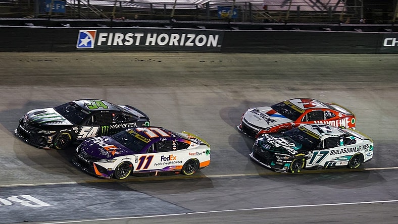 Sep 16, 2023; Bristol, Tennessee, USA; NASCAR Cup Series driver Ty Gibbs (54) and driver Denny Hamlin (11) during the Bass Pro Shops Night Race at Bristol Motor Speedway. Mandatory Credit: Randy Sartin-USA TODAY Sports