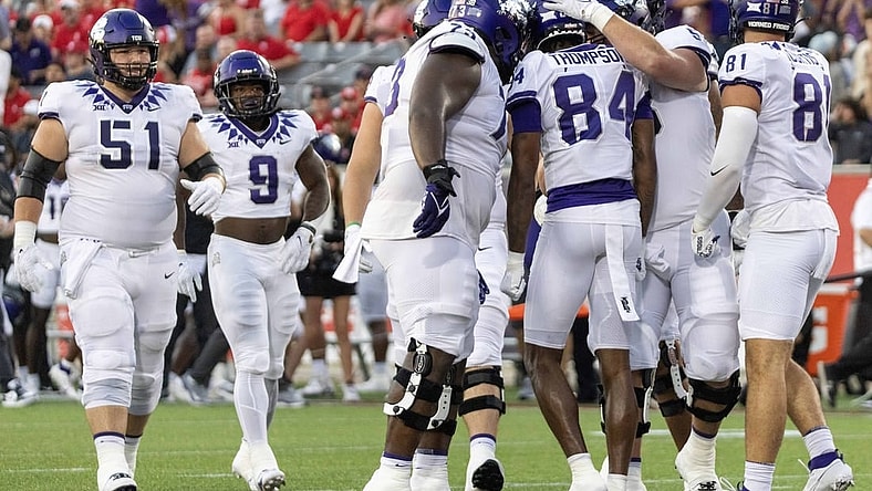 Sep 16, 2023; Houston, Texas, USA; TCU Horned Frogs wide receiver Warren Thompson (84) celebrates his touchdown with teammates against the Houston Cougars in the first half at TDECU Stadium. Mandatory Credit: Thomas Shea-USA TODAY Sports