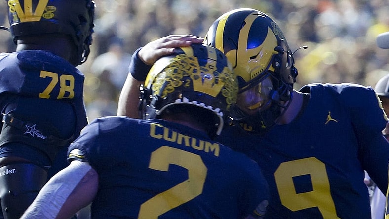 Sep 16, 2023; Ann Arbor, Michigan, USA;  Michigan Wolverines running back Blake Corum (2) celebrates with quarterback J.J. McCarthy (9) after scoring a touchdown against the Bowling Green Falcons in the first half at Michigan Stadium. Mandatory Credit: Rick Osentoski-USA TODAY Sports