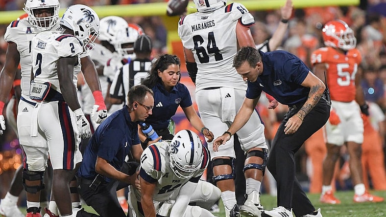 Sep 16, 2023; Clemson, South Carolina; Florida Atlantic quarterback Casey Thompson (11) is hurt in the game with Clemson during the second quarter against Florida Atlantic at Memorial Stadium.  Mandatory Credit: Ken Ruinard-USA TODAY NETWORK