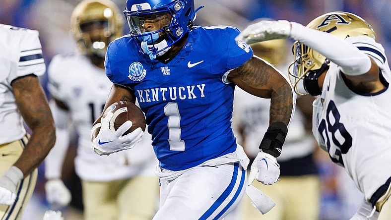Sep 16, 2023; Lexington, Kentucky, USA; Kentucky Wildcats running back Ray Davis (1) carries the ball into the end zone and scores a touchdown during the fourth quarter against the Akron Zips at Kroger Field. Mandatory Credit: Jordan Prather-USA TODAY Sports