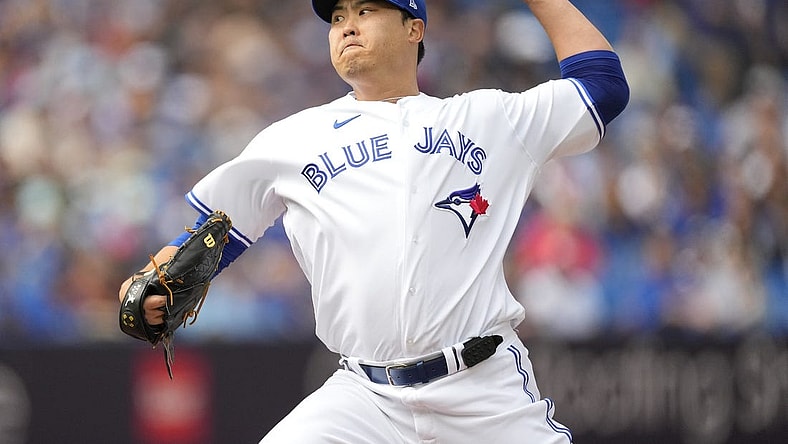 Sep 17, 2023; Toronto, Ontario, CAN; Toronto Blue Jays starting pitcher Hyun Jin Ryu (99) pitches to the Boston Red Sox during the first inning at Rogers Centre. Mandatory Credit: John E. Sokolowski-USA TODAY Sports