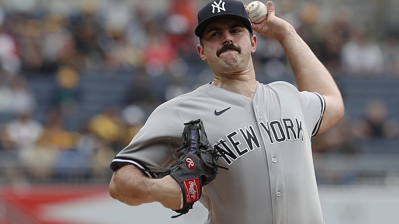 Sep 17, 2023; Pittsburgh, Pennsylvania, USA; New York Yankees starting pitcher Carlos Rodon (55) throws a pitch against the Pittsburgh Pirates during the first inning at PNC Park. Mandatory Credit: Charles LeClaire-USA TODAY Sports