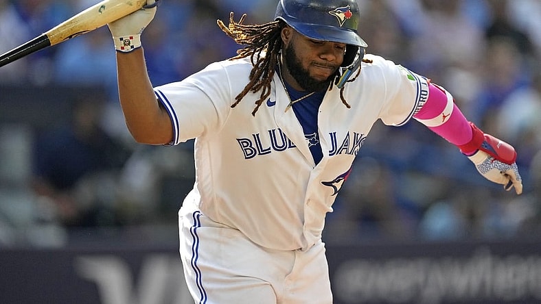Sep 17, 2023; Toronto, Ontario, CAN; Toronto Blue Jays first baseman Vladimir Guerrero Jr. (27) reacts after flying out to the Boston Red Sox during the eighth inning at Rogers Centre. Mandatory Credit: John E. Sokolowski-USA TODAY Sports