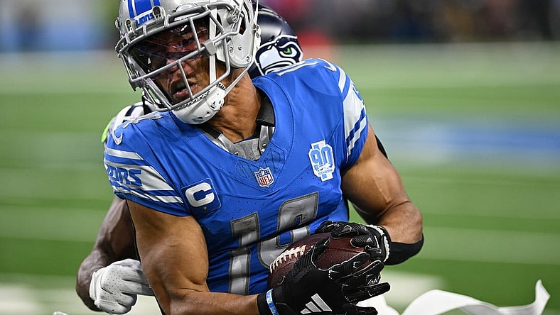 Sep 17, 2023; Detroit, Michigan, USA; Detroit Lions wide receiver Amon-Ra St. Brown (14) catches a pass against the Seattle Seahawks in the second quarter at Ford Field. Mandatory Credit: Lon Horwedel-USA TODAY Sports