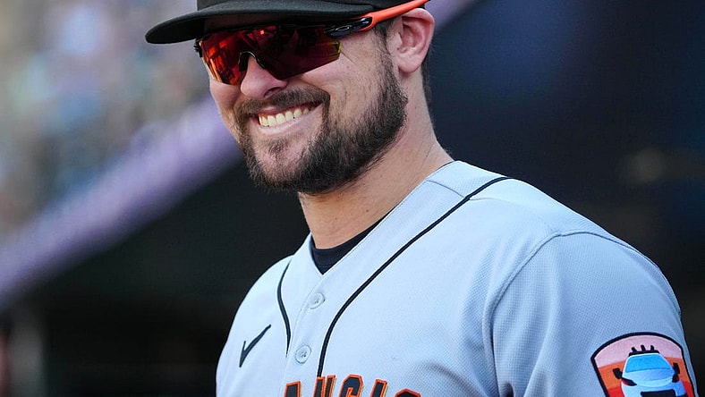 Sep 17, 2023; Denver, Colorado, USA; San Francisco Giants third baseman J.D. Davis (7) reacts in the seventh inning against the Colorado Rockies at Coors Field. Mandatory Credit: Ron Chenoy-USA TODAY Sports