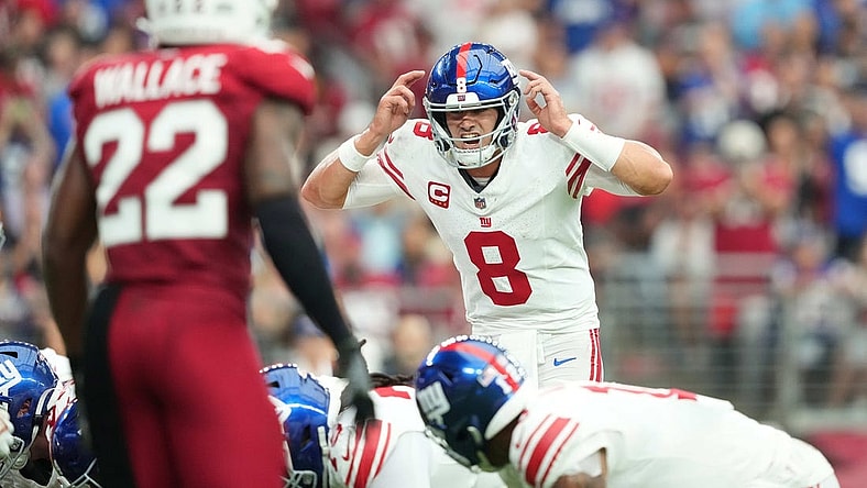 Sep 17, 2023; Glendale, Arizona, USA; New York Giants quarterback Daniel Jones (8) calls signals against the Arizona Cardinals during the second half at State Farm Stadium. Mandatory Credit: Joe Camporeale-USA TODAY Sports
