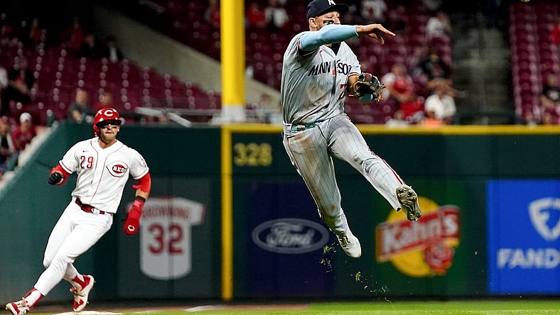 Minnesota Twins third baseman Royce Lewis (23) throws to first base for an out in the seventh inning of a baseball game against the Cincinnati Reds, Monday, Sept. 18, 2023, at Great American Ball Park in Cincinnati.