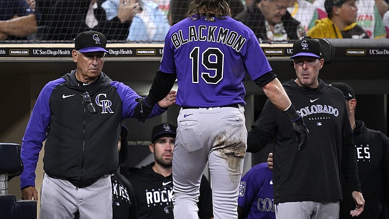 Sep 18, 2023; San Diego, California, USA; Colorado Rockies right fielder Charlie Blackmon (19) is congratulated at the dugout by manager Bud Black (left) after scoring a run against the San Diego Padres during the third inning at Petco Park. Mandatory Credit: Orlando Ramirez-USA TODAY Sports