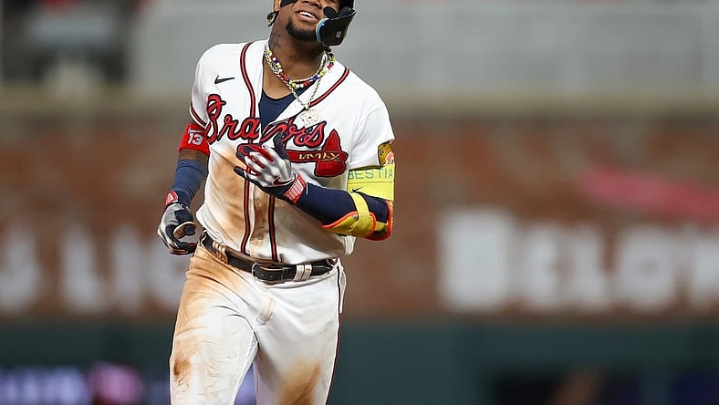 Sep 19, 2023; Atlanta, Georgia, USA; Atlanta Braves right fielder Ronald Acuna Jr. (13) celebrates after a home run against the Philadelphia Phillies in the sixth inning at Truist Park. Mandatory Credit: Brett Davis-USA TODAY Sports