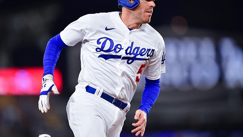 Sep 19, 2023; Los Angeles, California, USA; Los Angeles Dodgers first baseman Freddie Freeman (5) advances to third against the Detroit Tigers during the first inning at Dodger Stadium. Mandatory Credit: Gary A. Vasquez-USA TODAY Sports