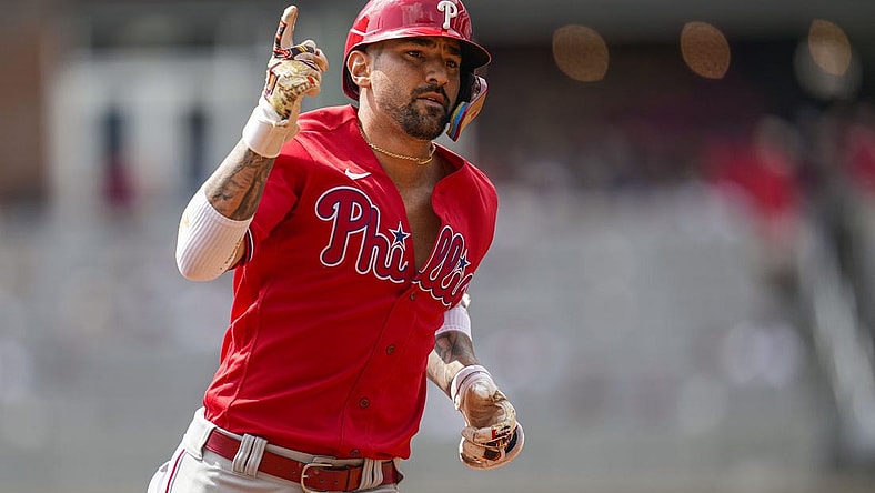 Sep 20, 2023; Cumberland, Georgia, USA; Philadelphia Phillies right fielder Nick Castellanos (8) reacts after hitting a home run against the Atlanta Braves during the second inning  at Truist Park. Mandatory Credit: Dale Zanine-USA TODAY Sports