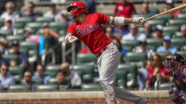 Sep 20, 2023; Cumberland, Georgia, USA; Philadelphia Phillies right fielder Nick Castellanos (8) hits a home run against the Atlanta Braves during the second inning  at Truist Park. Mandatory Credit: Dale Zanine-USA TODAY Sports