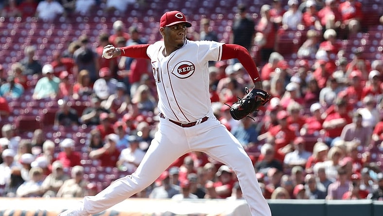 Sep 20, 2023; Cincinnati, Ohio, USA; Cincinnati Reds starting pitcher Hunter Greene (21) throws against the Minnesota Twins during the first inning at Great American Ball Park. Mandatory Credit: David Kohl-USA TODAY Sports