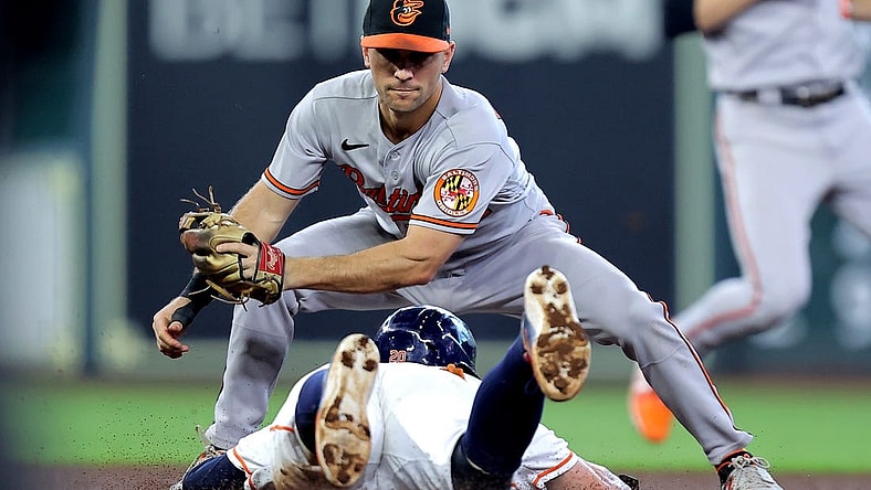 Sep 20, 2023; Houston, Texas, USA; Baltimore Orioles shortstop Gunnar Henderson (2) tags out Houston Astros left fielder Chas McCormick (20) on a stolen base attempt during the third inning at Minute Maid Park. Mandatory Credit: Erik Williams-USA TODAY Sports