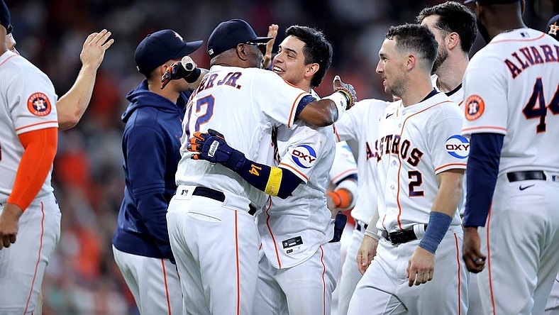 Sep 20, 2023; Houston, Texas, USA; Houston Astros center fielder Mauricio Dubon (14) celebrates with Houston Astros manager Dusty Baker Jr (12) after hitting a walk off single against the Baltimore Orioles during the ninth inning at Minute Maid Park. Mandatory Credit: Erik Williams-USA TODAY Sports
