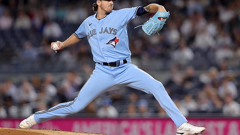 Sep 20, 2023; Bronx, New York, USA; Toronto Blue Jays starting pitcher Kevin Gausman (34) pitches against the New York Yankees during the first inning at Yankee Stadium. Mandatory Credit: Brad Penner-USA TODAY Sports
