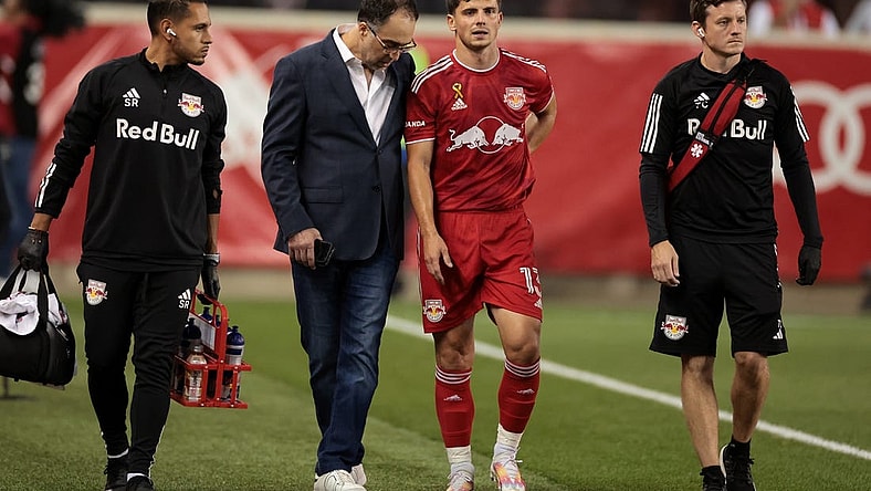 Sep 20, 2023; Harrison, New Jersey, USA; New York Red Bulls forward Dante Vanzeir (13) walks with medical staff in the first half against the Austin FC at Red Bull Arena. Mandatory Credit: Vincent Carchietta-USA TODAY Sports
