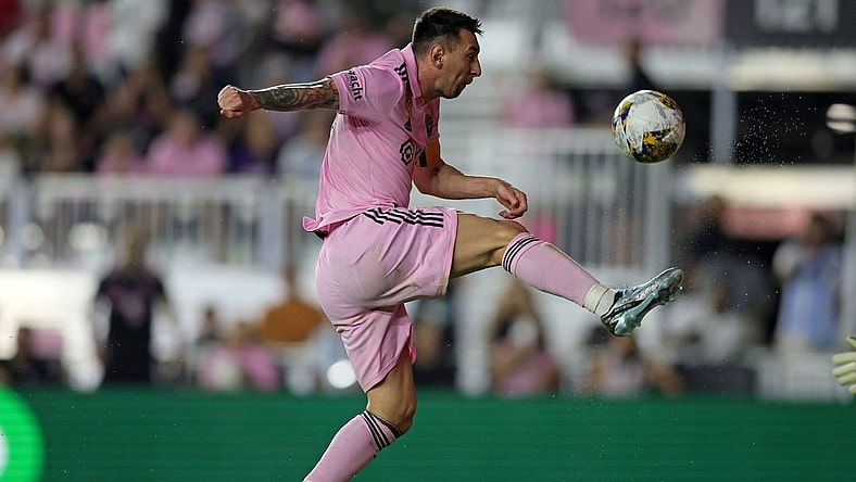 Sep 20, 2023; Fort Lauderdale, Florida, USA; Inter Miami forward Lionel Messi (10) kicks the ball against the Toronto FC during the first half at DRV PNK Stadium. Mandatory Credit: Sam Navarro-USA TODAY Sports