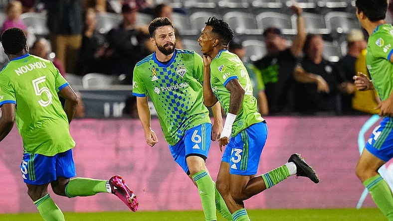 Sep 20, 2023; Commerce City, Colorado, USA; Seattle Sounders midfielder Joao Paulo (6) and Leo Chu (23) celebrate a goal in the first half at Dick's Sporting Goods Park. Mandatory Credit: Ron Chenoy-USA TODAY Sports