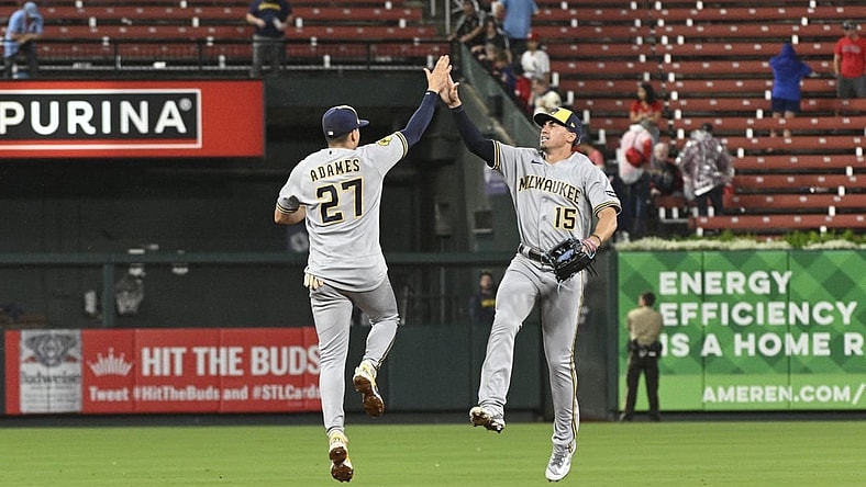 Sep 20, 2023; St. Louis, Missouri, USA; Milwaukee Brewers left fielder Tyrone Taylor (15) celebrates with shortstop Willy Adames (27) after defeating the St. Louis Cardinals at Busch Stadium. Mandatory Credit: Jeff Le-USA TODAY Sports