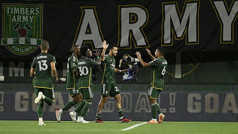 Sep 20, 2023; Portland, Oregon, USA;  Portland Timbers midfielder Cristhian Paredes (22) celebrates with teammates after scoring against San Jose Earthquakes during the first half at Providence Park. Mandatory Credit: Troy Wayrynen-USA TODAY Sports