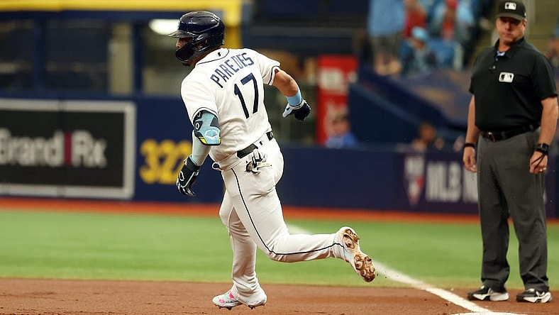 Sep 21, 2023; St. Petersburg, Florida, USA; Tampa Bay Rays third baseman Isaac Paredes (17) hits a RBI double against the Los Angeles Angels at Tropicana Field. Mandatory Credit: Kim Klement Neitzel-USA TODAY Sports