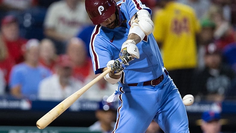 Sep 21, 2023; Philadelphia, Pennsylvania, USA; Philadelphia Phillies right fielder Nick Castellanos (8) hits a two RBI single during the first inning against the New York Mets at Citizens Bank Park. Mandatory Credit: Bill Streicher-USA TODAY Sports