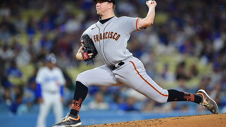 Sep 21, 2023; Los Angeles, California, USA; San Francisco Giants starting pitcher Kyle Harrison (45) throws against the Los Angeles Dodgers during the second inning at Dodger Stadium. Mandatory Credit: Gary A. Vasquez-USA TODAY Sports