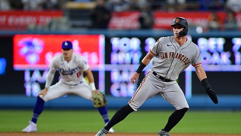 Sep 21, 2023; Los Angeles, California, USA; San Francisco Giants center fielder Tyler Fitzgerald (49) leads off from second against the Los Angeles Dodgers during the seventh inning at Dodger Stadium. Mandatory Credit: Gary A. Vasquez-USA TODAY Sports