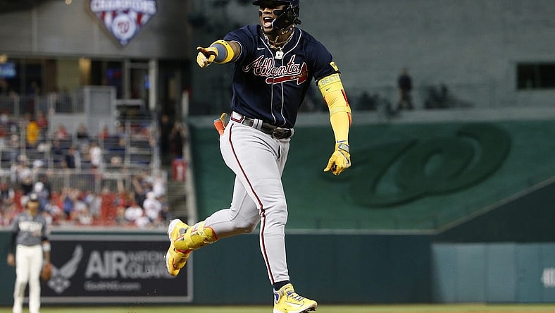 Sep 22, 2023; Washington, District of Columbia, USA; Atlanta Braves right fielder Ronald Acuna Jr. (13) celebrates while rounding the bases after hitting his 40th home run of the season against the Washington Nationals during the first inning at Nationals Park. Mandatory Credit: Amber Searls-USA TODAY Sports