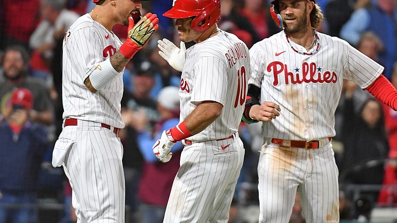 Sep 22, 2023; Philadelphia, Pennsylvania, USA; Philadelphia Phillies catcher J.T. Realmuto (10) celebrates with right fielder Nick Castellanos (8) and designated hitter Bryce Harper (3) after hitting a three run home run during the sixth inning against the New York Mets at Citizens Bank Park. Mandatory Credit: Eric Hartline-USA TODAY Sports