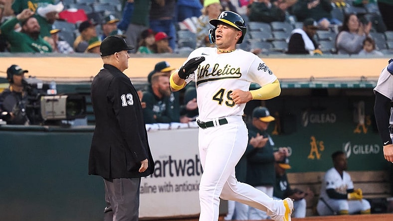Sep 22, 2023; Oakland, California, USA; Oakland Athletics first baseman Ryan Noda (49) scores a run against the Detroit Tigers during the first inning at Oakland-Alameda County Coliseum. Mandatory Credit: Kelley L Cox-USA TODAY Sports